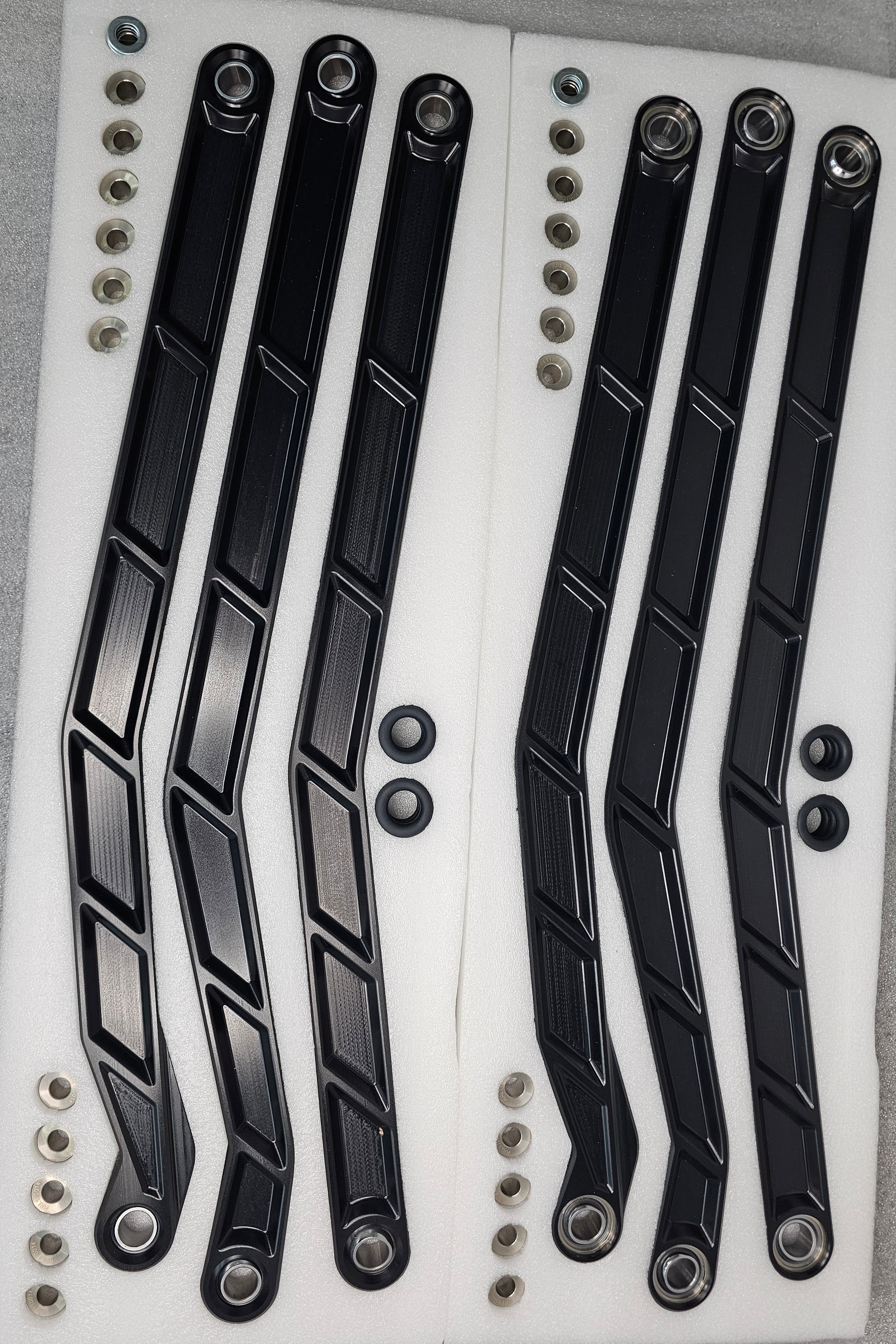 2017 to Current Can-Am X3 Maverick High Clearance Radius Rods in Black Finish for 72" showcased on foam packing.