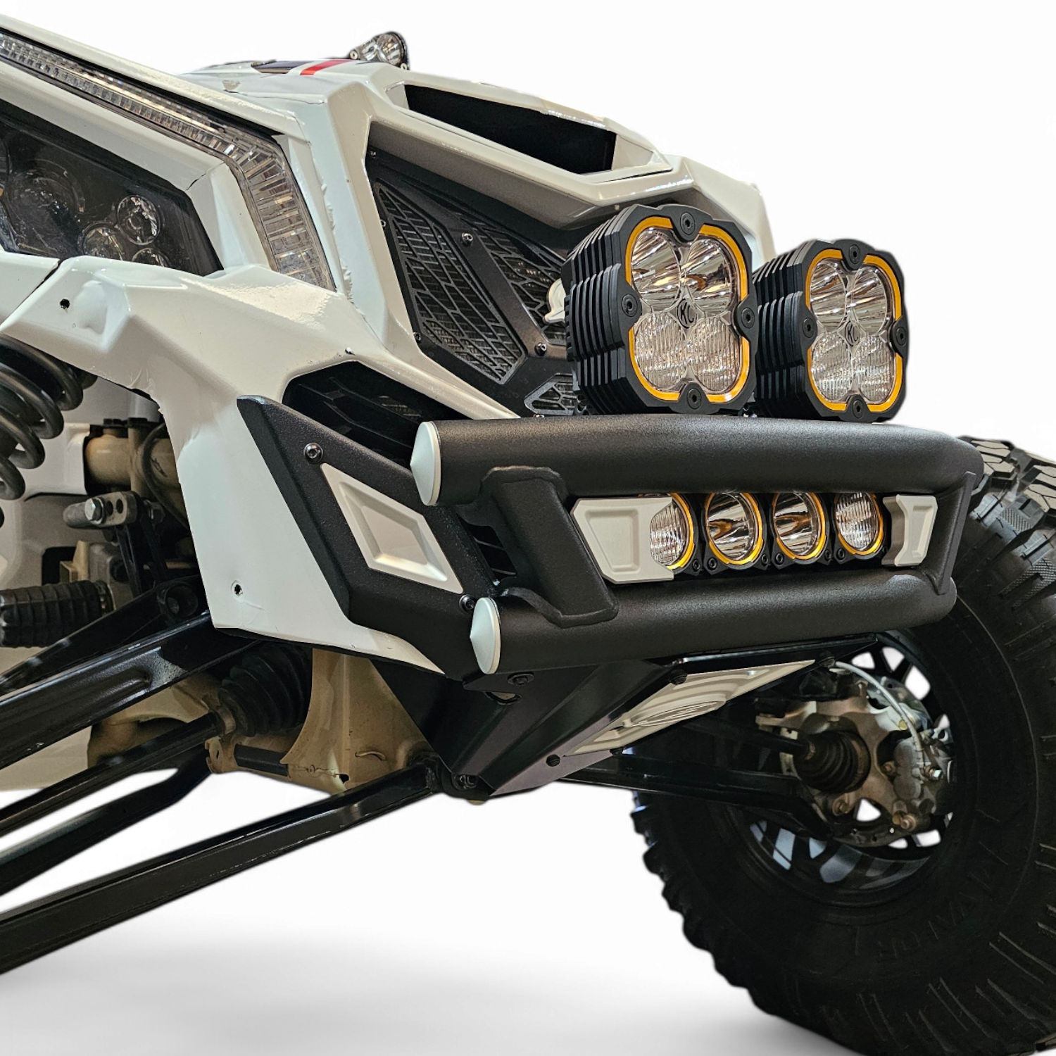 2017 + Can-Am X3 Maverick Amp Front Bumper showcasing unique design with lights and durable material components.
