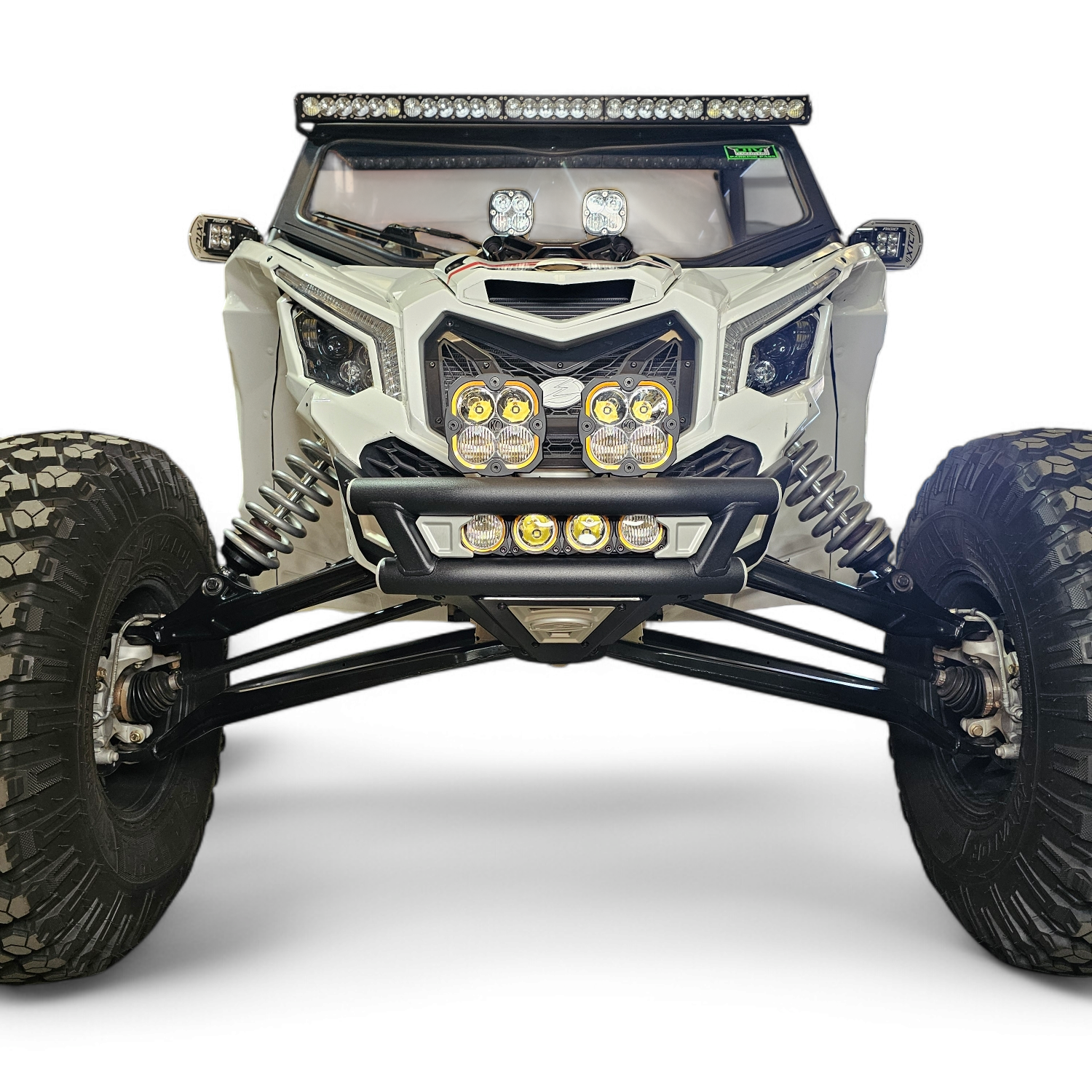 2017 + Can-Am X3 Maverick Amp Front Bumper equipped with off-road lights and rugged tires.
