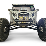 2017 + Can-Am X3 Maverick Amp Front Bumper equipped with off-road lights and rugged tires.