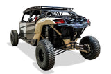 2017-2024 Can Am X3 Maverick Volt Series Baja Spare Tire Rack installed on a side-by-side UTV, showcasing off-road capabilities.