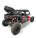 2017-2024 Can Am X3 Maverick Volt Series Baja Spare Tire Rack installed on a UTV for off-road adventures.