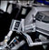 Axia Alloys Cell Phone Holder Adapter mounted on a UTV steering wheel, designed for off-road usage and easy accessibility.