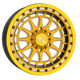17" Outlaw 6R | Forged 3-Piece | Beadlock UTV wheel in yellow with intricate design by Metal FX Offroad.