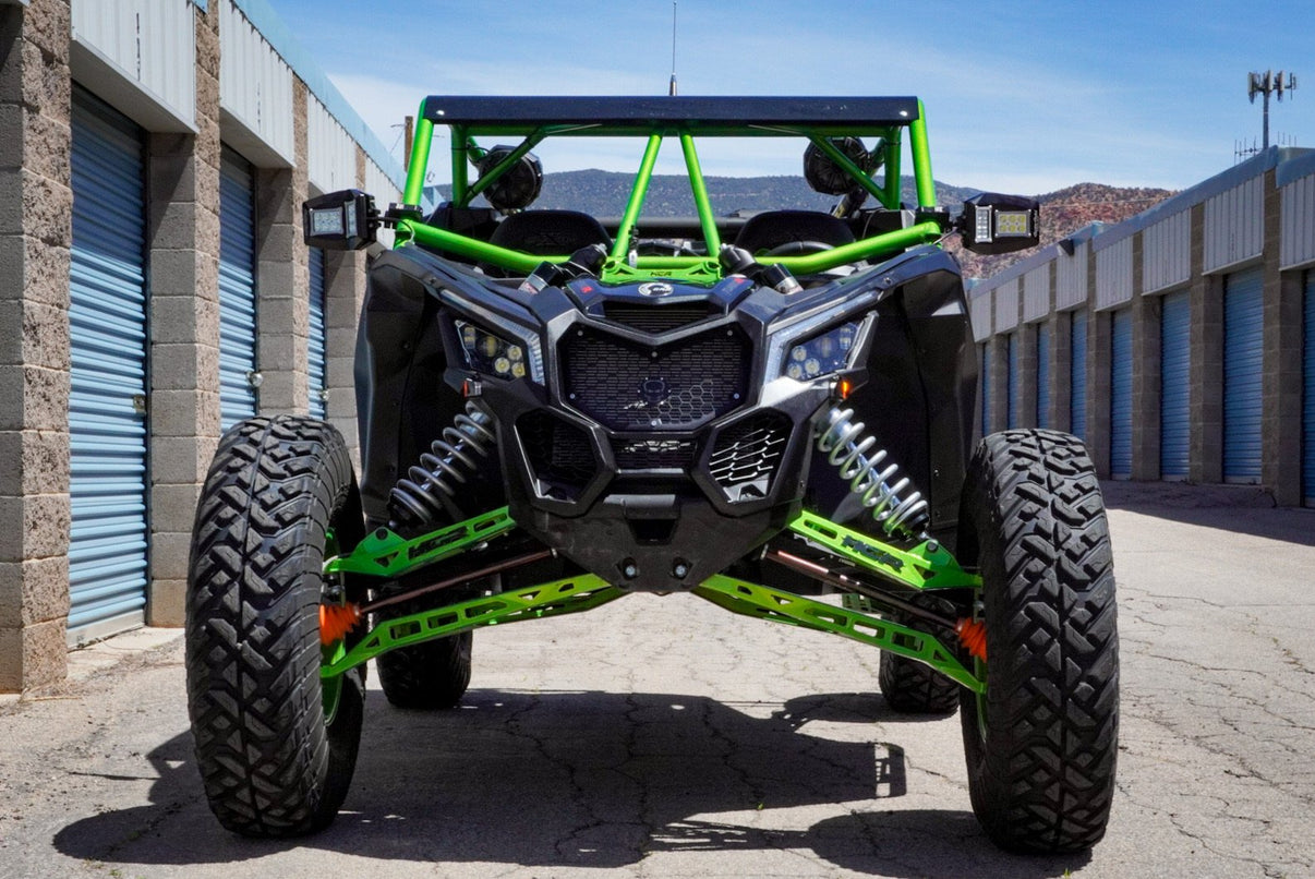 Can-Am Maverick X3 X RS 72" OEM "ELITE" Factory Replacement Suspension Kit front view with green accents and off-road tires.